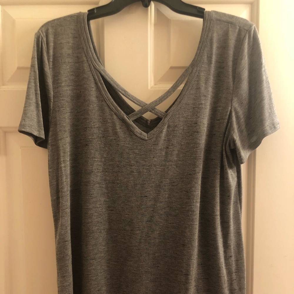 Super trendy gray shirt with criss cross!
